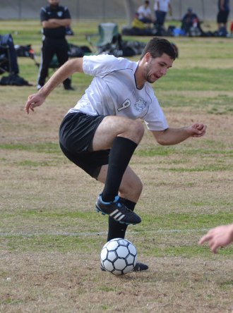 Lemoore's Bryce Aguilar controls the ball in Saturday's game against the Rangers.